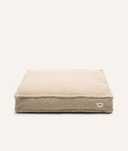 Lit pour chien en bouclette beige
